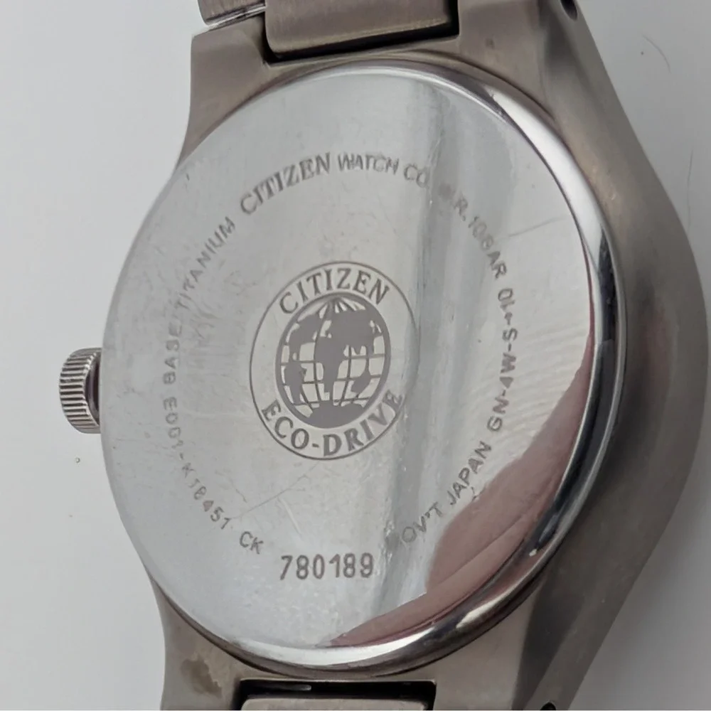 Citizen Eco-Drive Titanium E001-K18451 Women's WR100 Day Date Black Dial Watch